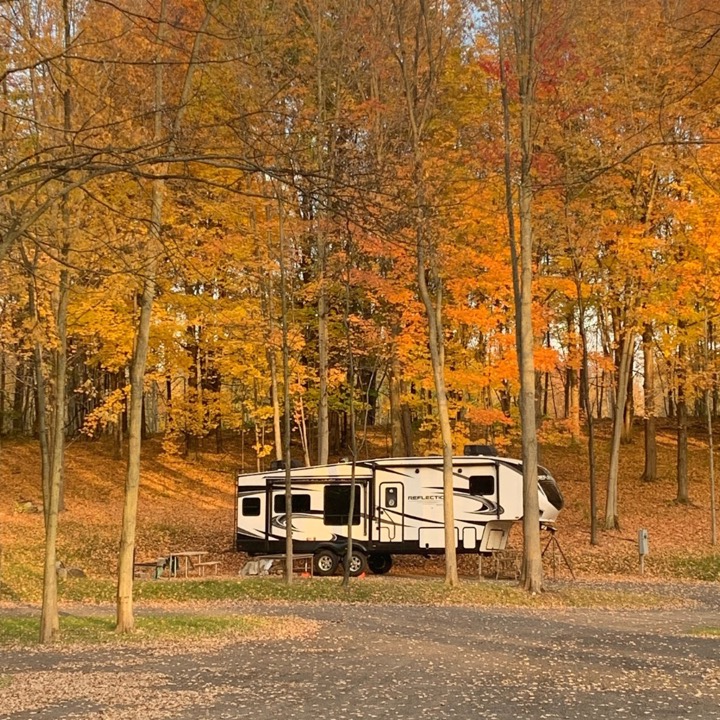 RV site under orange fall leaves
