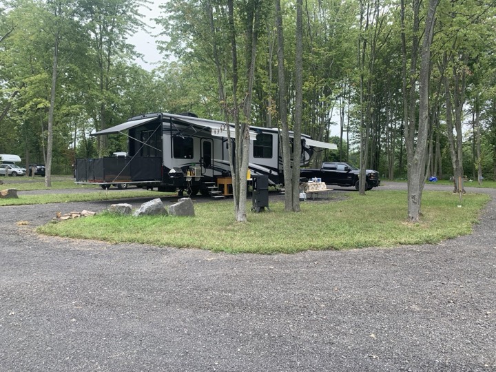 Fifth wheel on a full hook-up pull-through site